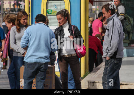 Pea men, peamen, shell men, con men, most of the people in this picture are part of the game to trap tourists in Benidorm Stock Photo