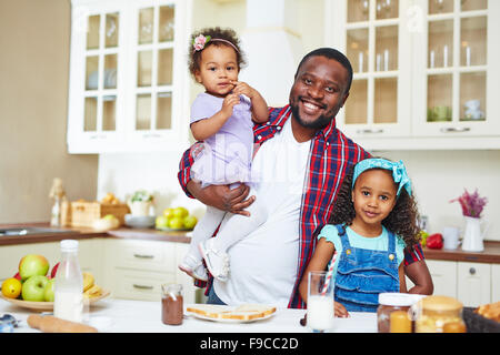 Happy African-American family having breakfast Stock Photo