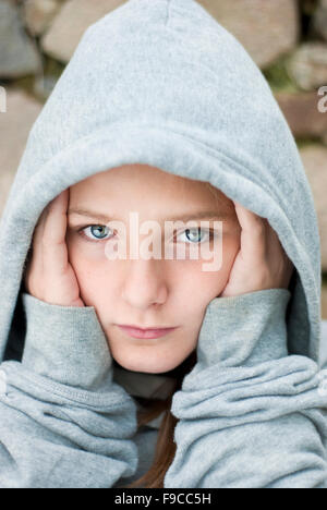 Little sad child is lonesome. Stock Photo