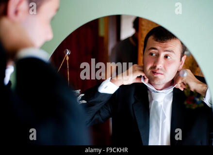 Groom is getting ready for the wedding Stock Photo