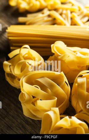 Mixed dry Pasta collection background close up. Stock Photo