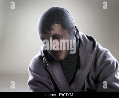 Dangerous man in mask is isolated on background Stock Photo