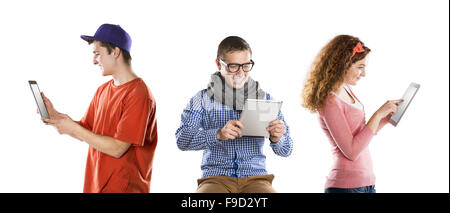 Beautiful young people with tablet in studio Stock Photo