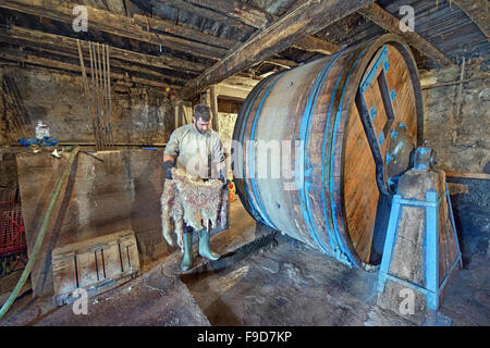 Working in the interior of an old tannery in Harmena neighbourhood found in Amfissa city, in Fokida region, Central Greece Stock Photo
