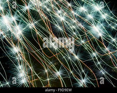 Holiday neon stars and lines as abstract background. Stock Photo
