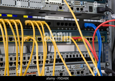 Patch Panel server rack with yellow cords Stock Photo - Alamy