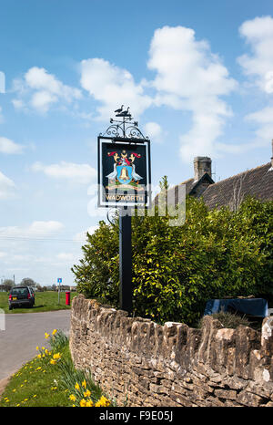 Wadworth inn sign 'The Bell on the Common' in Broughton Gifford Wiltshire uk eu Stock Photo