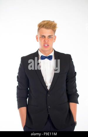 Close-up portrait of a handsome young man in a business suit on white background Stock Photo