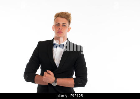 Close-up portrait of a handsome young man in a business suit on white background Stock Photo