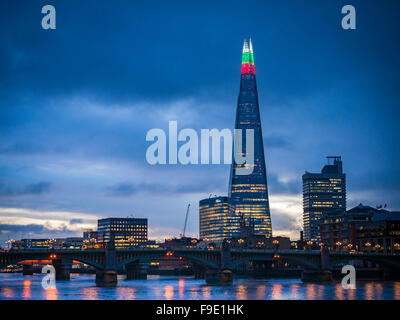 The Shard Building light's up for the Christmas season with alternating Green, Red and White lights at the top, London, England