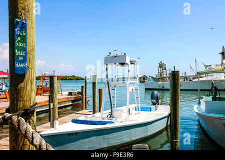 Boats, both private and commercial moored at Cortez docks in Florida Stock Photo