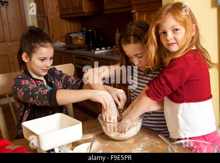 Rubbing the Butter. One step in the making of gingerbread is to rub the butter and flour together to make a breadcrumb texture. Stock Photo