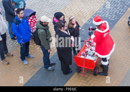 Bournemouth, UK. 16th Dec, 2015. The Christmas Coca Cola truck arrives at Pier Approach in Bournemouth, as part of its Holidays are Coming Christmas campaign festive tour visiting 46 locations around the country - giving out cans of drink Credit:  Carolyn Jenkins/Alamy Live News Stock Photo