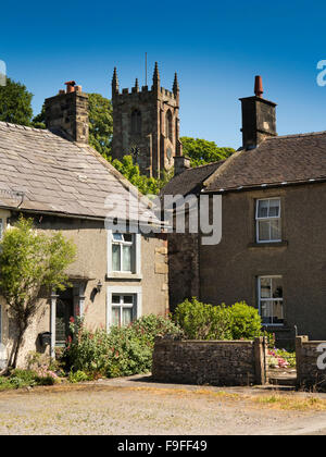 UK, England, Derbyshire, Hartington, Village houses below tower of St Giles’ church Stock Photo