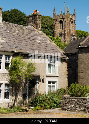 UK, England, Derbyshire, Hartington, Village houses below tower of St Giles’ church Stock Photo