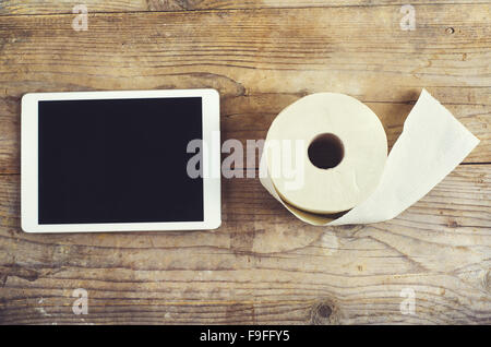 Toilet mix on a wooden floor background. View from above. Stock Photo