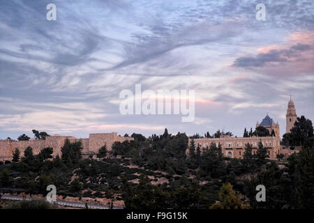 View of old city walls and Church of the Benedictine Abbey of the Dormition on top of mount Zion in Jerusalem Israel Stock Photo