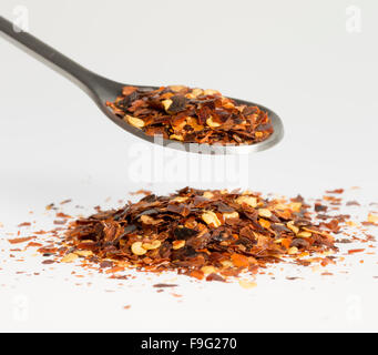 Dried Chili Pepper on Tablespoon Stock Photo