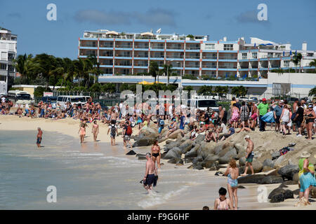 Maho beach in Saint Maarten in the Caribbean where aircraft fly low into Princess Juliana international airport Stock Photo