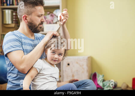 Young father with his cute little daughter Stock Photo