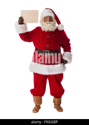 Full length portrait of Real Santa Claus carrying big bag full of gifts ...