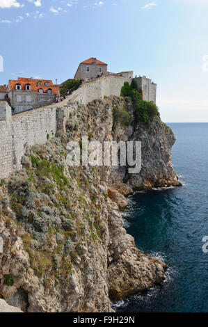 Tourists walking on the perimeter wall of the castle in the Old Town, Dubrovnik, Croatia. Stock Photo