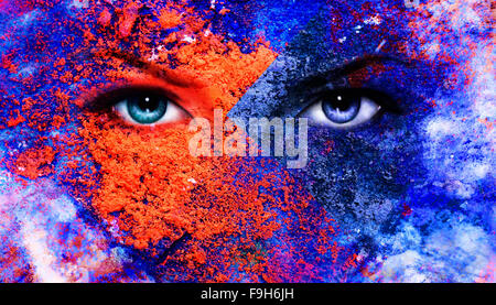 A pair of beautiful blue women eyes beaming, color earth effect, painting collage, violet makeu Stock Photo