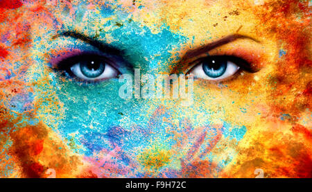 A pair of beautiful blue women eyes beaming, color rust effect, painting collage, violet makeup. Stock Photo