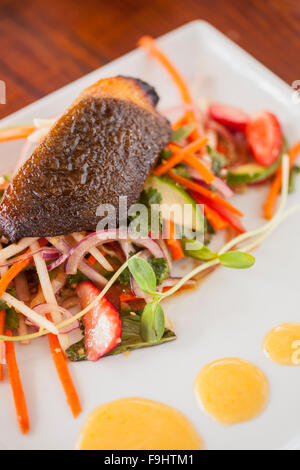 black cod with sriracha aioli and cucumber tamato Thai salad, Ocean Grill, Avila Beach, California Stock Photo