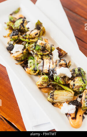 crispy brussels sprouts with smoked paprika aioli, dried cherries, goat cheese and balsamic reduction, Ocean Grill, Avila Beach, Stock Photo