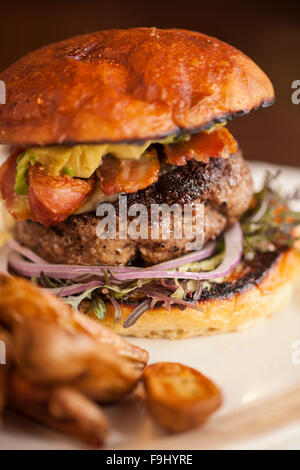 hamburger with avocado, bacon, cheese and onions,  Barbareno Restaurant, Santa Barbara, California Stock Photo