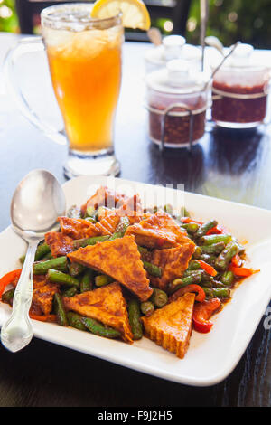 prik-king,a type of red curry,  with tofu and iced tea, Rice By Mama, Ventura, California Stock Photo