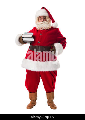 Santa Claus holding pile of books Full Length Portrait Isolated on White Background Stock Photo
