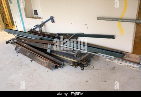 Old elevator or lift equipment being removed during refurbishment. 2014 Stock Photo