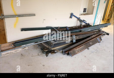 Old elevator or lift equipment being removed during refurbishment. 2014 Stock Photo