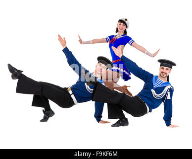 dancer team dressed as a sailors posing. Isolated on white background in full length. Stock Photo