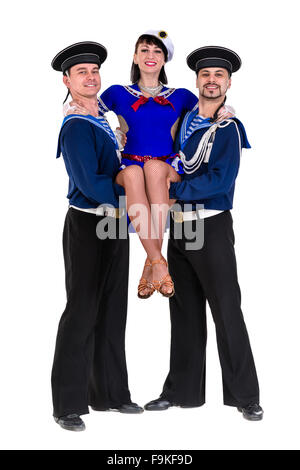 dancer team dressed as a sailors posing. Isolated on white background in full length. Stock Photo