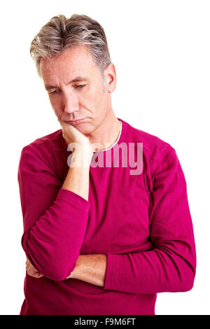 Sad senior man with grey hair looking down Stock Photo