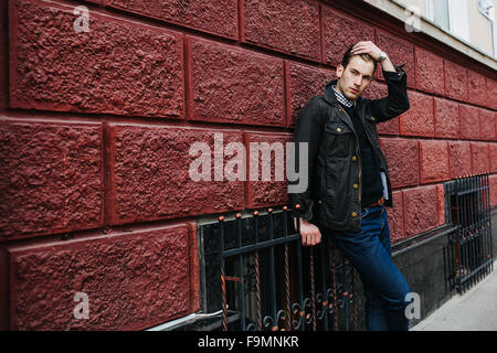 Confident man posing in selvedge  jeans Stock Photo