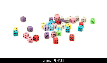 many small colorful plastic  dice isolated on white background Stock Photo