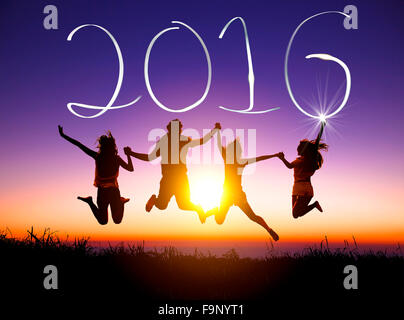 young group jumping and happy new year 2016 concept Stock Photo