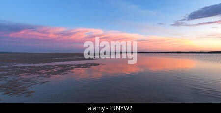 Pink sunset panorama of Inverloch foreshore beach, Gippsland, Victoria, Australia Stock Photo