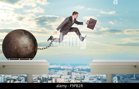 Image of young man jumping over gap Stock Photo