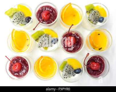 yogurt penna cotta with various fruits topping in glassware Stock Photo