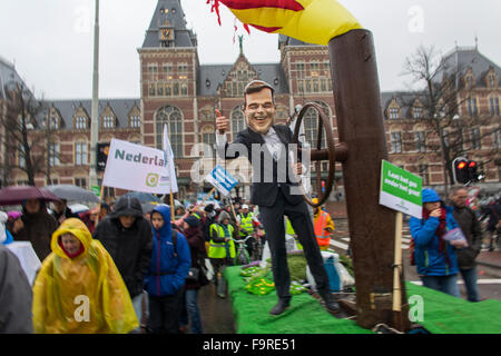 Several thousand protesters demonstrated  today (29 nov 2015) in Amsterdam against the current climate policy. Dutch prime minister Mark Rutte drilling for gas in Holland. Stock Photo