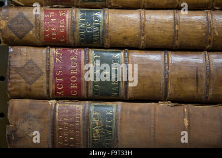 Legal text books and files stored on shelves in a record office Stock Photo