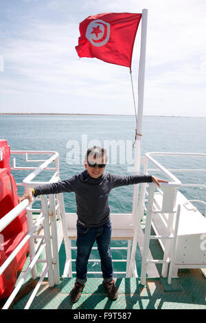 8-year-old boy on a Tunisian boat. Stock Photo