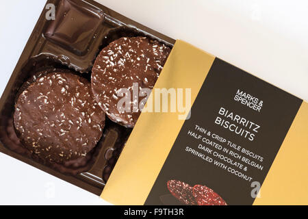 box of Marks & Spencer new Belgian Collection Biarritz biscuits open to show contents - thin & crisp tuile biscuits Stock Photo