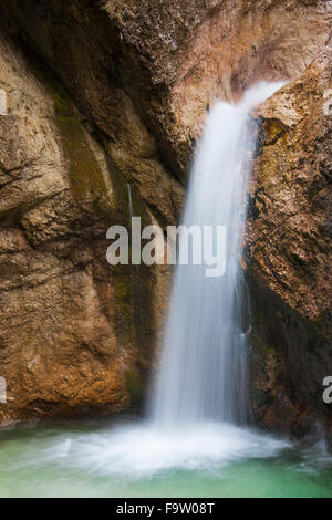 Waterfall in the river Almbach running through the Almbachklamm canyon in the Berchtesgaden Alps, Bavaria, Germany Stock Photo