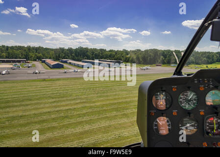 Aerial View Approaching Small Regional Airport In Helicopter Stock Photo